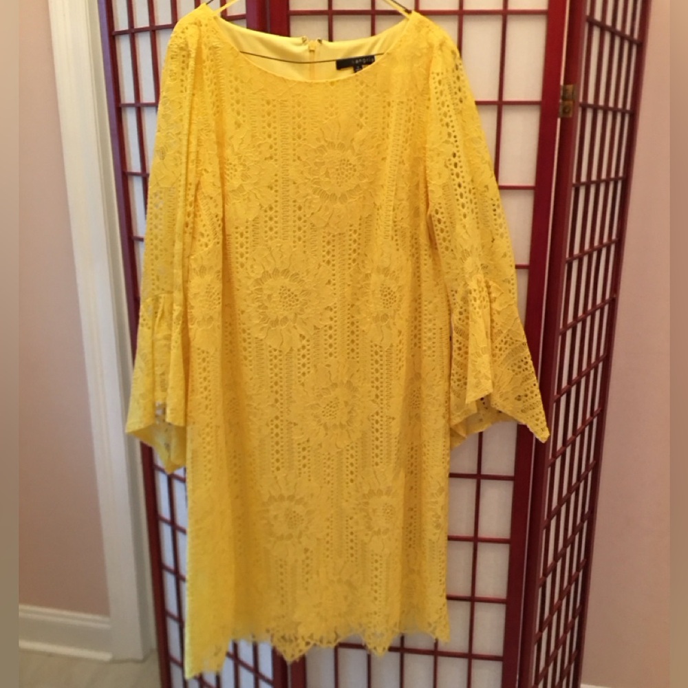 Yellow dress in size 16 with bell sleeves. Lace